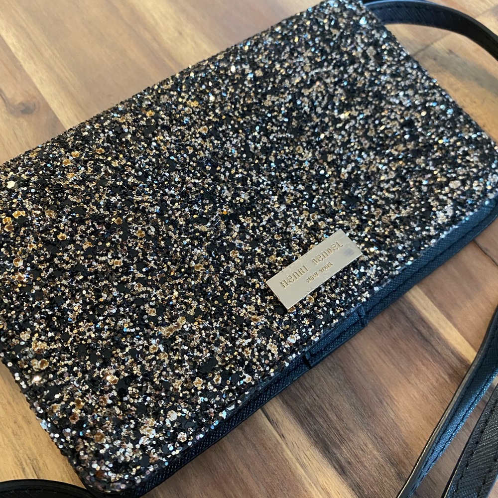 Henri Bendel wallet/cell phone holder on chain.